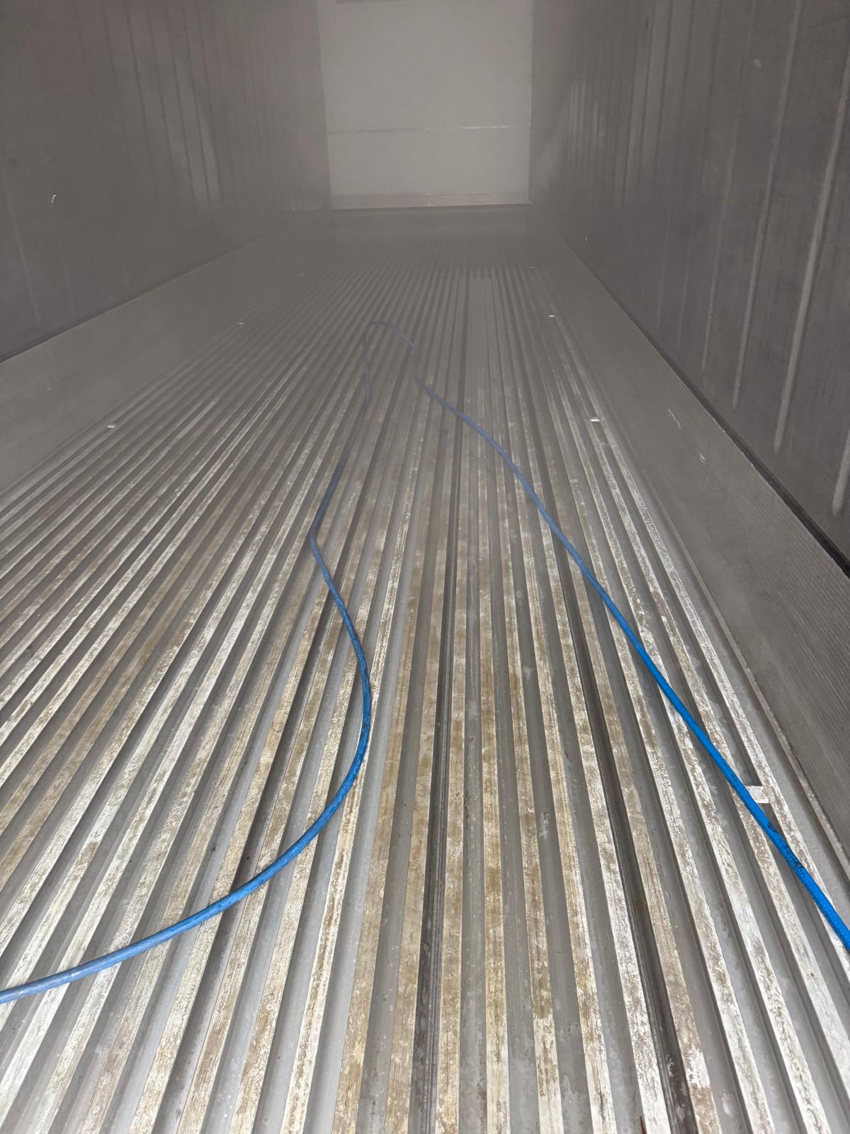 Inside reefer container during cleaning process